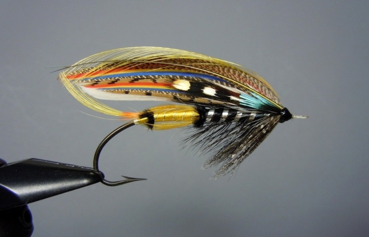 Jock Scott 4/0. Without a doubt the Jock Scott is one of the most popular classic salmon flies of today.  Along with the Green Highlander and the Gordon the Jock Scott is probably tied more often by tiers of True Classic salmon flies than anyother of the 