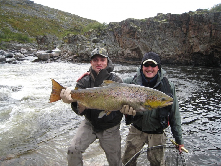 24lb Hen fish taken off the Eastern Liza River with guide Sasha , above the Tent pool . 