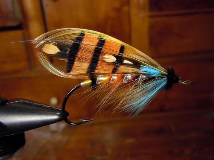 The Durham Ranger on a vintage 2/0 hook. The gut,tail and crow is recycled from the orginal fly and might be over a hundred years by now.