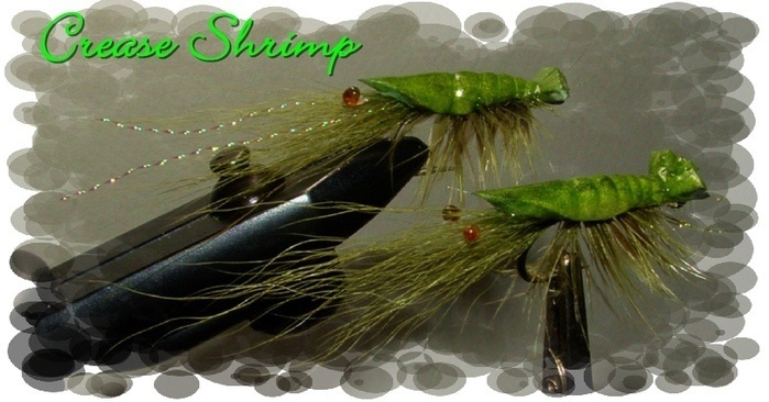 Floating Crease Shrimp...bucktail front legs, burnt mono eyes, crystal flash feelers and then olive hackle palmered with Fun Foam wrapped on top to create the shape. I add a lead eye for the sinking version in shallow water.