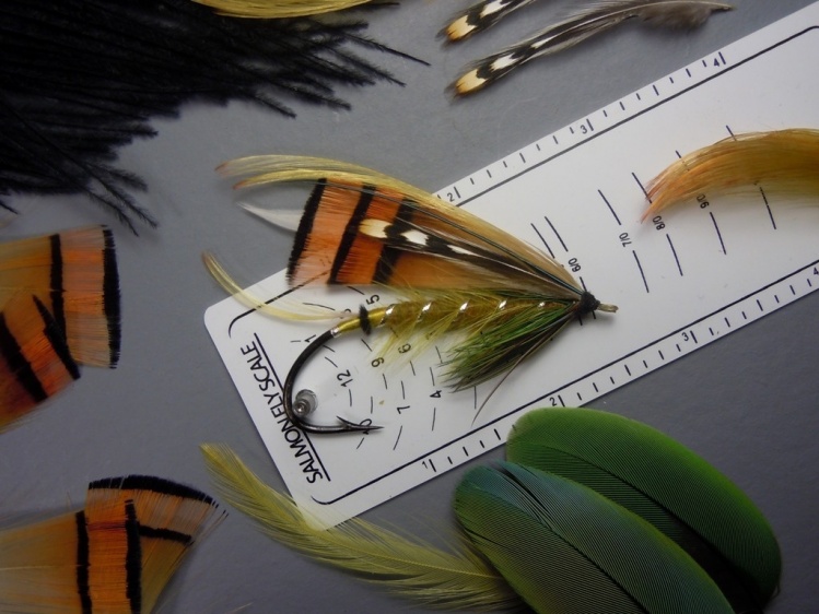 Olive Ranger Variant , copied from foto of a old fly . The hook is a old 6/0