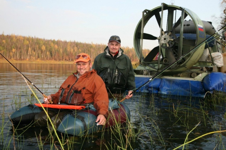 Fly fishermans and our hovercraft boat