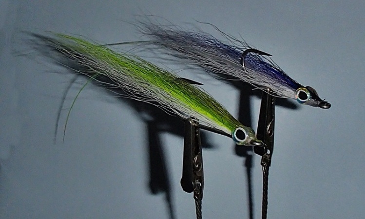 Two more sand eel flys for the coming late fall run of stripers.  Rachael Marie, a member here, gets the credit for getting me started on this style and Bob Popovics for developing this flye.
