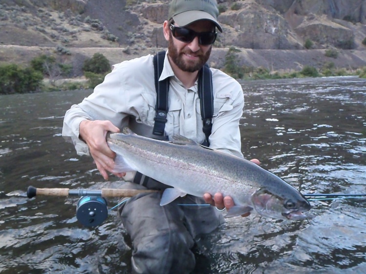 Central Oregon River: A nice native on the swing! He came out of the water on the take - surprised me! I heard and saw him before I felt him, luckily I remembered to drop the loop.