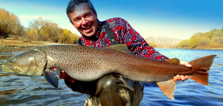 Peter with a good Taimen from our camp pool at the Selenge River in October ...