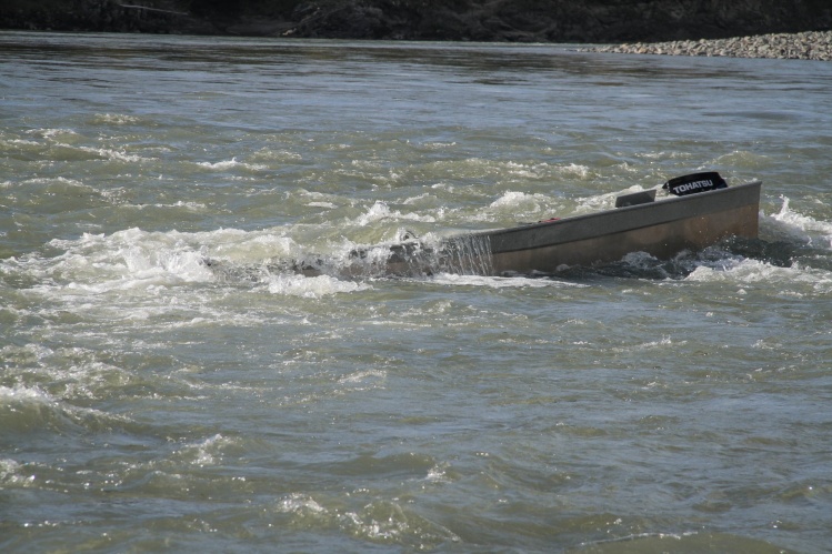 This river can swallow you and your boat. it was lodged on a rock and they couldn't even pull it out with 2 boats. the power of water