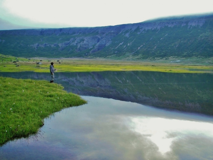 Fishing for brown trout and arctic char in a nice lake.