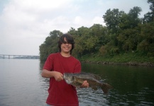His first Smallmouth!...8 3/4 pounds..My son, Alex and me on the Tennessee River, Wilson Dam, Florence, Alabama....truly an epic fish...