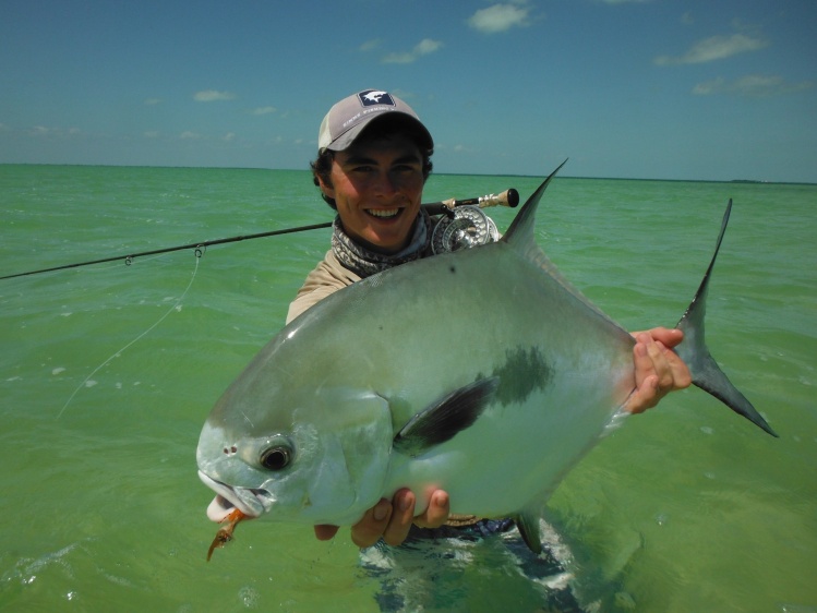 The only thing better than wading up on big tailing permit, is landing that big tailing permit.