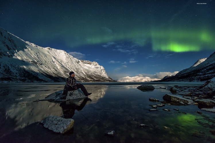 Fly fishing for sea-run brown trout under the gloom of the Northern Lights is something truly spectacular. Photo: Stian Rekdal