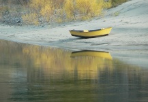 Yellow drift boat on the Snake River in Idaho
