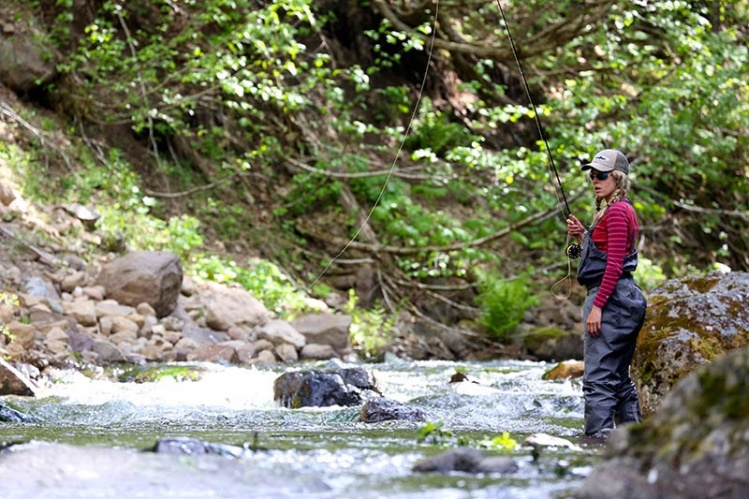 Emerald Water Anglers guide and instructor Abbie Schuster high sticks the tail-out of this run on a stream just an hour from downtown Seattle.