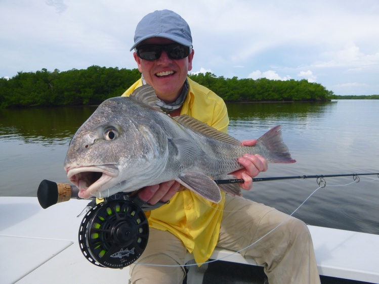  reel christend with a red fish and my first black drum nice.