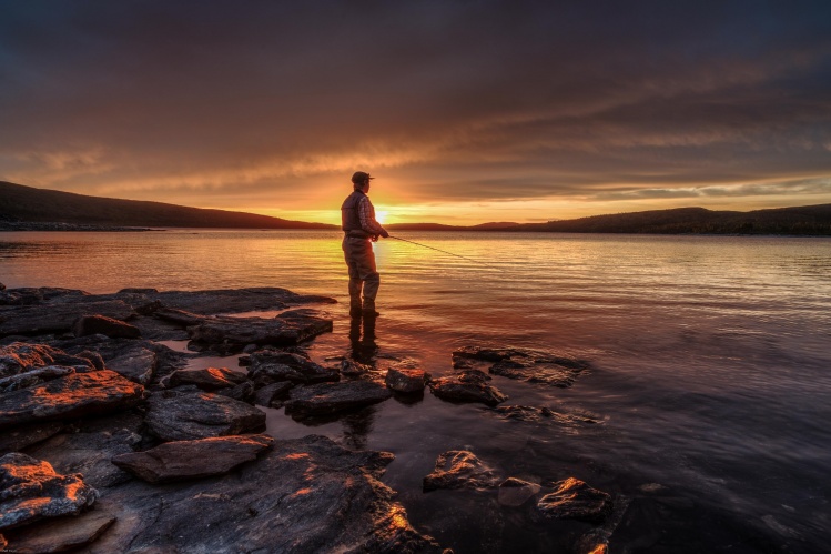 Sunset at a local trout lake (Norway). George Howard is fishing for char...