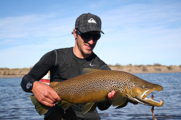 Andres with a Limay river Brown