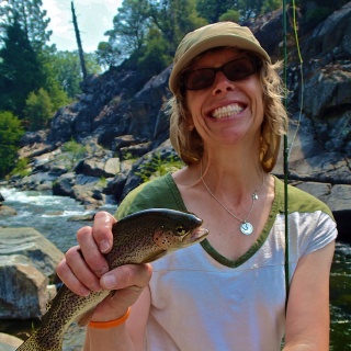 First trout on a fly rod while fly fishing in Yosemite with Yosemite Fly  Fishing Guide