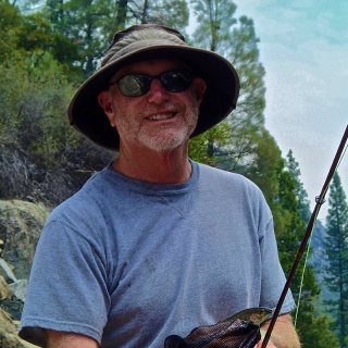 First trout on a fly rod while fly fishing in Yosemite with Yosemite Fly  Fishing Guide