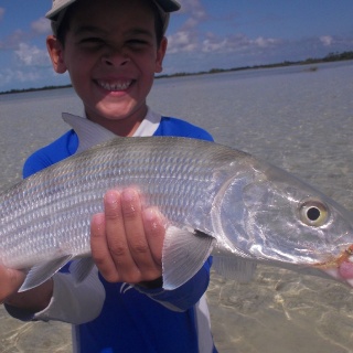 my 6yr old son maykol with his first bonefish on the flyrod