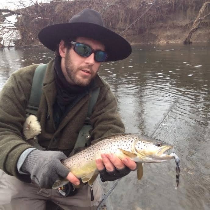 This lovely lady was seduced by a Game Changer I tied up with white and gray hen saddle hackles; Blain Chocklett was kind enough to share his techniques with my fly shop about a month ago and I can't stop tying these things up. 