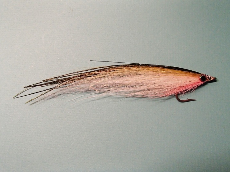 Bob Popovics' Bucktail Deceiver.  Since finding good white feathers are getting harder to find bucktail is a great material because of it movement in the water.