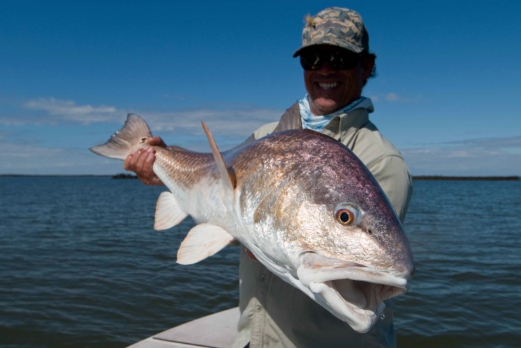 Tom with a fat February bull redfish