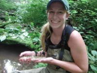 Trout Unlimited's Kathleen Lavelle displays a wild brook trout 