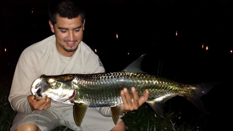 Good friend Gus on his first freshwater tarpon on 7wt, caught over 40 miles inland. Miami, Florida
