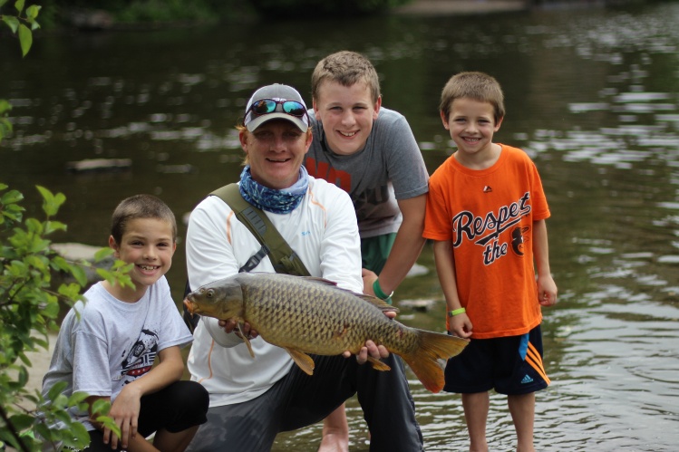 An audience turns into a pack of carp fans.