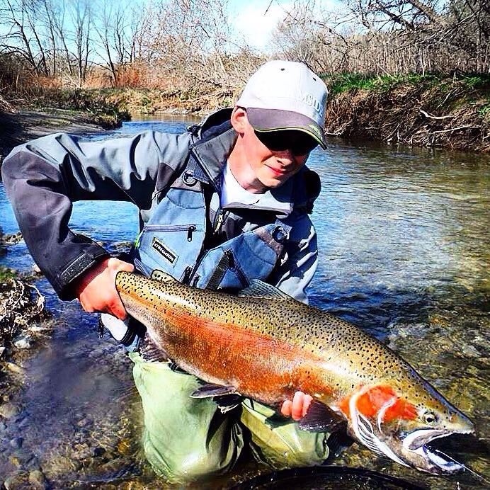 My pb steelhead this spring! I got him on a stonefly! Really nice colours too!