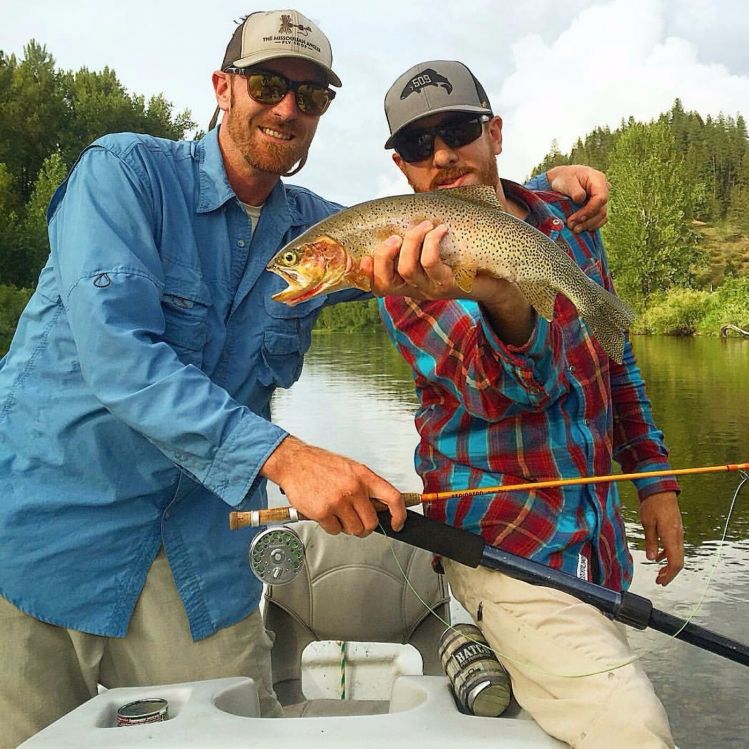 My buddy holding my 3wt butterstick while I pose with this beautiful westslope cutty. Coeur D'Alene River in Idaho.