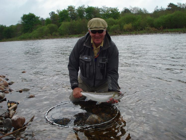 The owner of Lower Dess Estate with a cracking fish