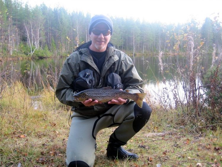 One fine brown trout  who take on a streaking caddis fly