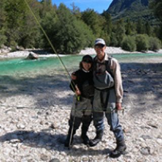 Love and fishing in the air, river Soča