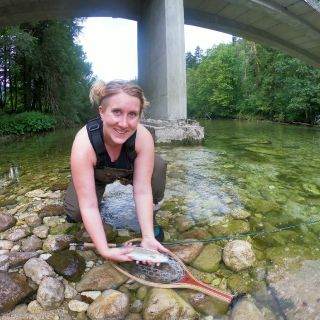 The girl from "downunder" and her first ever fish caught with flyfishing rod, river Sava Bohinjka