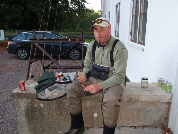 Hungry after fishing - bread, sausage and Coke