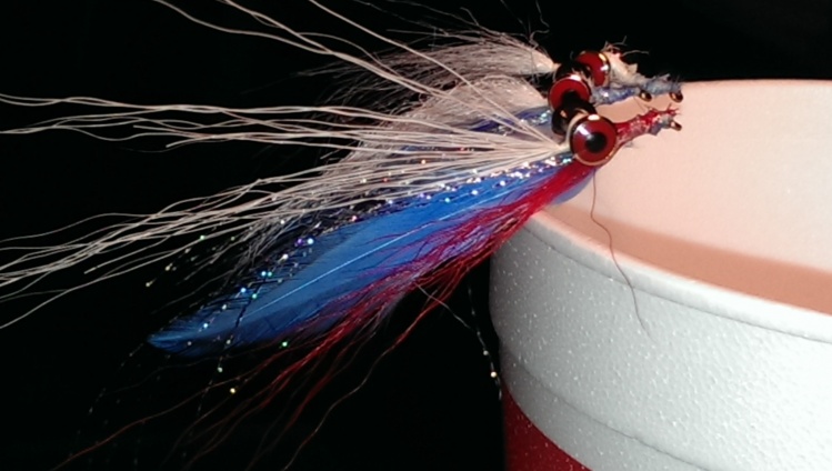 first attempt at Clouser minnow.
a little help from Capt. Morgan and the Foo Fighters