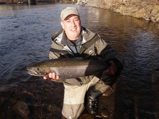 Our friend Johnny Payne with a nice Salmon River Steelhead 