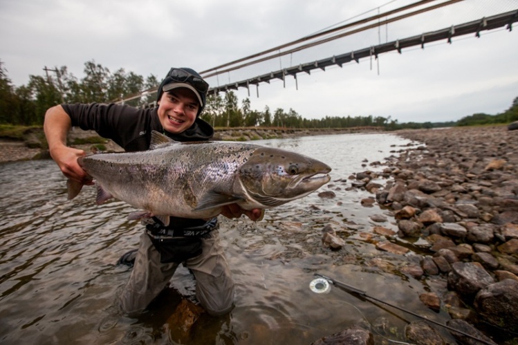 Catching your first salmon on a fly rod is something truly spectacular. Here's Vebjørn Kjelland with his first Atlantic... Photo: Espen Ørud