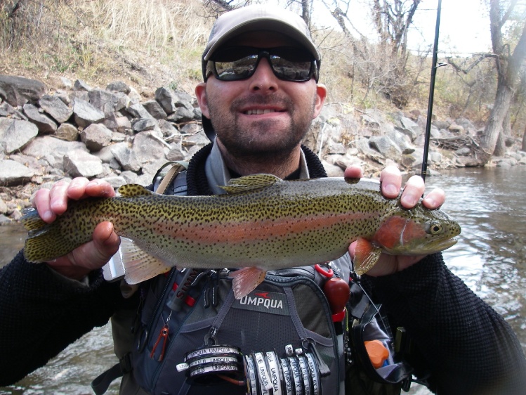 A Happy Client learning how to Euro Nymph on Boulder Creek. Biggest fish caught by a client this year. 