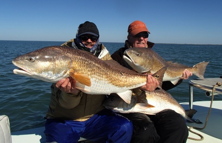 My friend Perry Lisser, also a Fly dreamer, all bundled up with some 20lb + redfish.