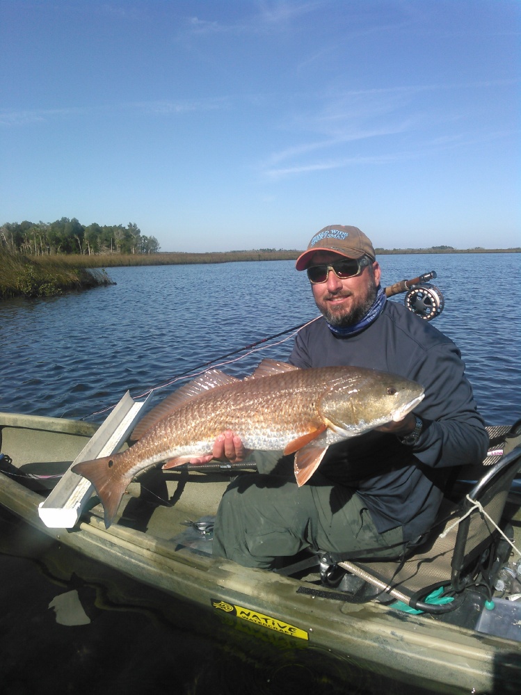 My good friend and fly fishing mentor nailed this 34" red on The Nature Coast of FL