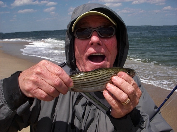 The winning smallest game fish this cute striper.