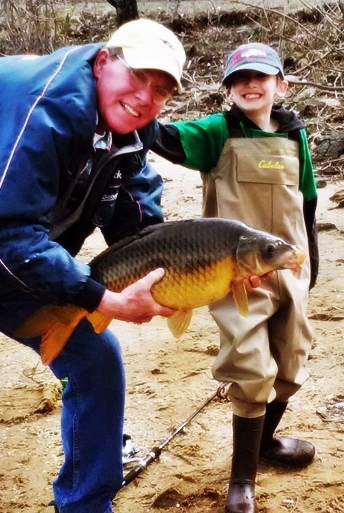 My grandson with a nice carp on his 8lb test spin rod, we have a fly rod ready to go.