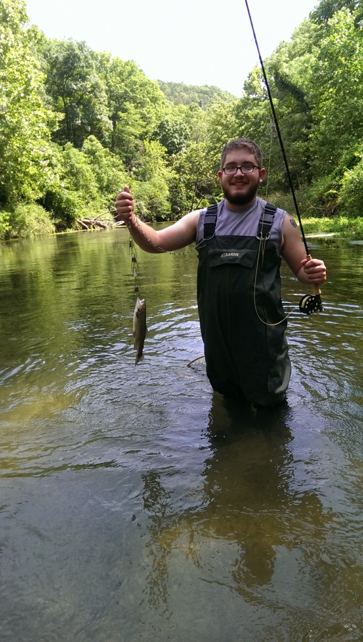 First trout on the fly rod for my son, and on a fly he tied!