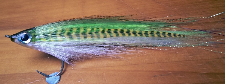 Thinking mackerel patterns! I love the way DNA Frosty Fish Fiber and Bucktail work together! 
This is on a #4/0 but think I'm going to scale it down to a #1/0 for my summer sea bass fishing!