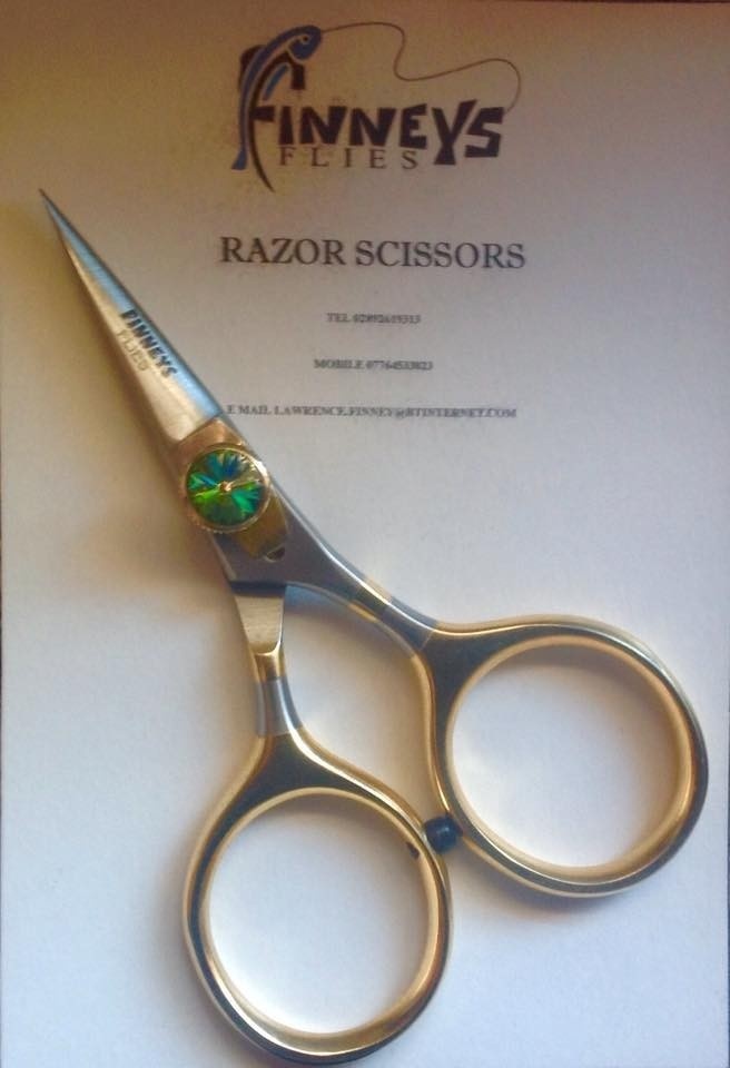 Just got deliver of  100 of the new Razor scissors, extremely sharp and made of surgical stainless steel. really pleased with them