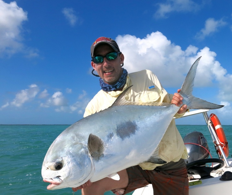 Happy fisherman with this beautiful permit