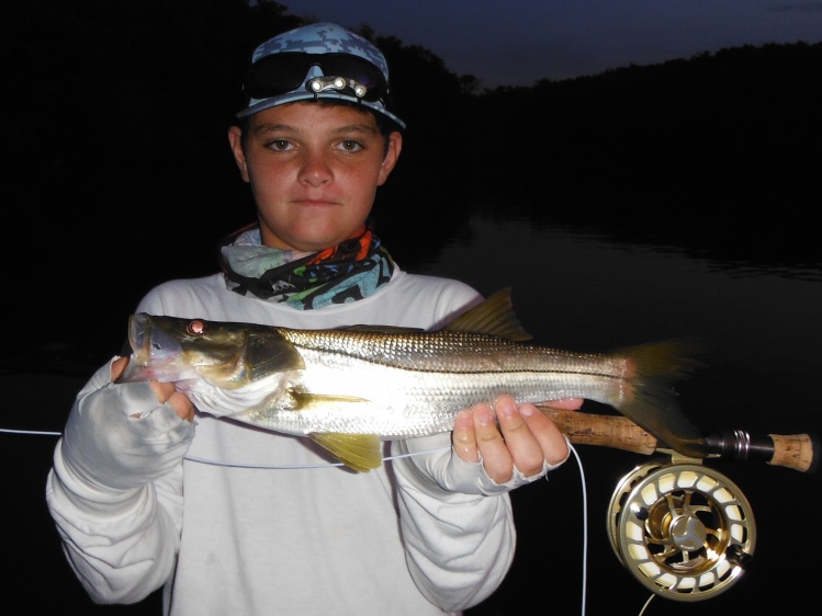 Little buddy's first snook on fly
