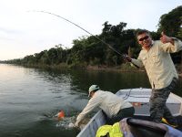 A very happy Randy celebrates his very first Redtail Catfish