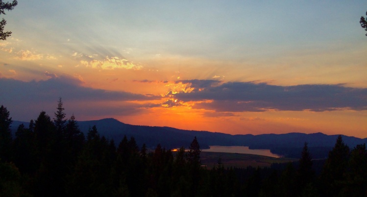 Smoke from wild fires make for beautiful sunsets.  This one is over Newman Lake, Washington.